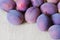 Closeup of blue plums on burlap