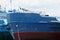 Closeup of blue and red prow of ship