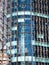 Closeup of blue windows of a tall business building