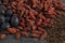 Closeup of Blueberries, Goji, and Flax Seeds on Stone Surface