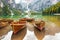 Closeup on boats on lake braies in south tyrol