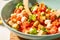 Closeup of a bowl filled with classic Panzanella salad.