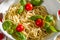 Closeup of a bowl of noodles and vegetables