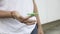 Closeup of boy playing with green fidget spinner -