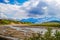 Closeup of braided river with blue mountains in the background in Denali National Park in Alaska USA