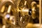 Closeup of brassy Gears, concept Teamwork and Togetherness