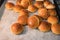 Closeup bread rolls in mold on wood table