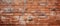 Closeup of a brick wall facade made of rectangular composite building material