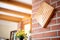 closeup of brick and wood intersection in farmhouse wall