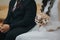 Closeup of a bride and groom sitting next to each other in church