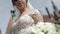 Closeup of bride hold bouquet in her hands