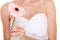 Closeup of bride white wedding dress with flower