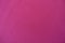 Closeup of bright pink plain fabric