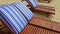 Closeup brown chaise-longues with striped mattresses on beach