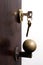 Closeup of brown wooden door lock and knob