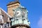 Closeup of building decor and clock tower. Emerson Chambers Newcastle Waterstones building