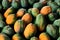 Closeup of bunch of ripe papayas