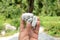 Closeup the bunch white black stone hold hand over out of focus grey green background