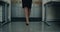 Closeup business woman legs walking down the office. 4k