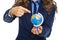 Closeup on business woman pointing on earth globe