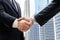 Closeup businessmen shaking hands