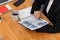 Closeup businesswoman analyzing financial paper at harmony office workplace.