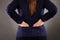 Closeup of businesswoman with back pain