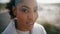 Closeup calm woman posing at sand dunes. Attractive african american enjoying