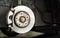 Closeup car disk brake maintenance service in car garage and copy space