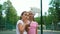 Closeup of carefree young girls making funny faces and smiling for selfies