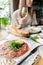 Closeup carpaccio, meat plate in the restaurant. Variety of dishes on the table. Italian cuisine