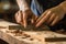 Closeup of carpenter hands at workshop, measuring the wood. Generative AI