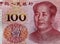 Closeup of a cash hundred Chinese Renminbi under the lights