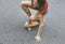 Closeup of caucasian woman enjoying skateboard