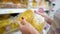 Closeup caucasian woman near shop shelves and choosing pasta in grocery market