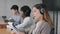 Closeup caucasian young business woman call center help line operator salesperson wears headset speaks advises client