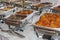 Closeup of chafing dishes at a party