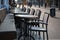 Closeup of chairs and tables in front of a closed cafe in Neuwied, Germany - COVID-19 lockdown