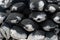 Closeup charcoal briquettes shallow DOF