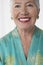 Closeup Of Cheerful Senior woman In Red Lipstick