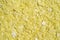 Closeup chemical ingredient on laboratory table Top View. Sodium sulfide flakes, a yellow appearance owing to the presence of