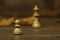 Closeup of chess pieces on a blurry brown background - every pawn dreams of becoming a queen