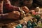 Closeup of a childs hands carefully crafting an