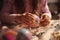 Closeup of a childs hands carefully crafting an