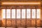 Closeup Chinese old wooden frame door with decorative pattern under the sunshine