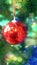 Closeup of Chirstmas tree decorate with Red ball hanging on