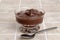 Closeup chocolate pudding with a spoon