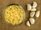 Closeup of chopped garlic in a glass bowl