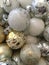 Closeup Christmas ornaments gold silver and white