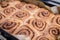 Closeup cinnamon rolls in tray